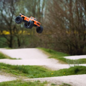 Новый радиоуправляемый Монстр 1:8 ARRMA Outcast 6S 4WD Brushless RTR (оранжевый) 2019г ARA106042T2