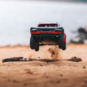 Радиоуправляемый Шорт-корс ARRMA 1:7 MOJAVE 6S V2 4WD BLX RTR с системой Spektrum Firma (красный) ARA7604V2T2