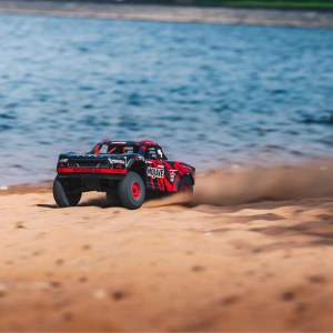 Радиоуправляемый Шорт-корс ARRMA 1:7 MOJAVE 6S V2 4WD BLX RTR с системой Spektrum Firma (красный) ARA7604V2T2