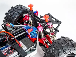 Радиоуправляемый монстр Remo Hobby Dinosaurs Master Brushless UPGRADE PLUS красный 4WD 2.4G 1/8 RTR — фото 8