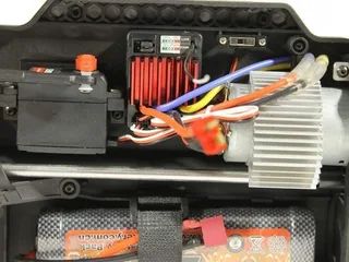 Радиоуправляемый монстр Remo Hobby MMAX UPGRADE (красный) 4WD 2.4G 1/10 RTR — фото 15