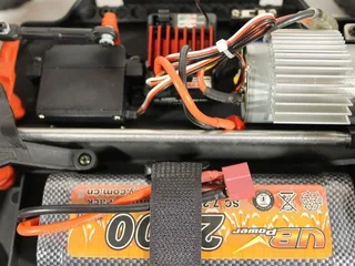 Радиоуправляемый монстр Remo Hobby MMAX UPGRADE (красный) 4WD 2.4G 1/10 RTR — фото 20