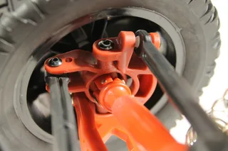 Радиоуправляемый монстр Remo Hobby MMAX Brushless UPGRADE (красный) 4WD 2.4G 1/10 RTR — фото 19